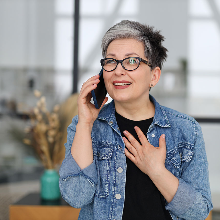 Woman on her mobile phone discussing her pension options